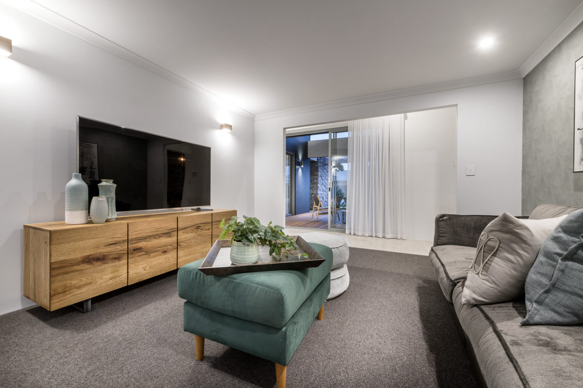 Bodega Bay home design featuring a cosy media room with outdoor access, tailored for modern corner house designs and lifestyle-focused layouts.