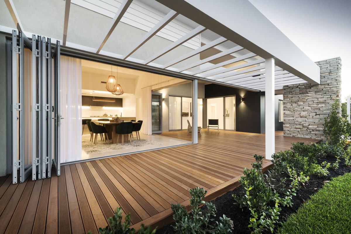 Bodega Bay home design featuring timber deck, stacker doors, and alfresco living, perfect for modern corner block house designs.