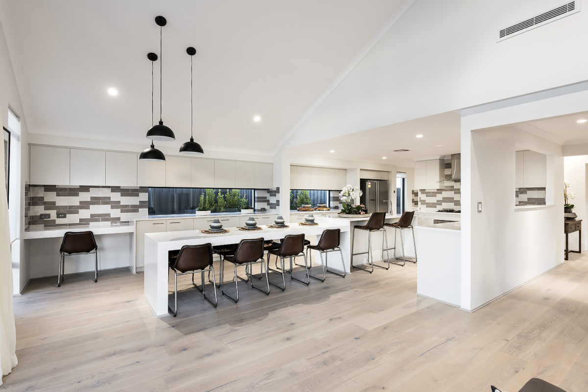 Far shot of the dining area of The Colorado, a modern farmhouse design by Plunkett Homes.