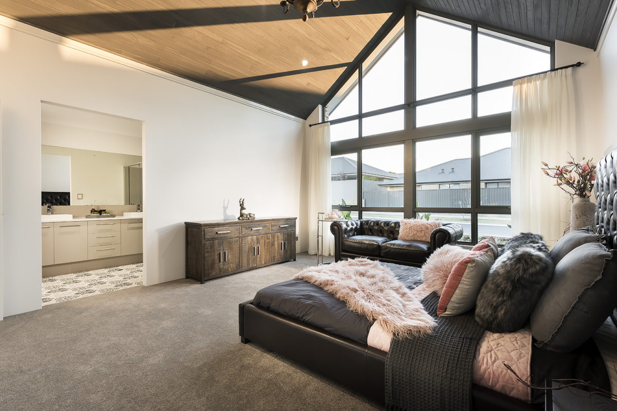 Master suite of The Colorado, a modern farmhouse design by Plunkett Homes.