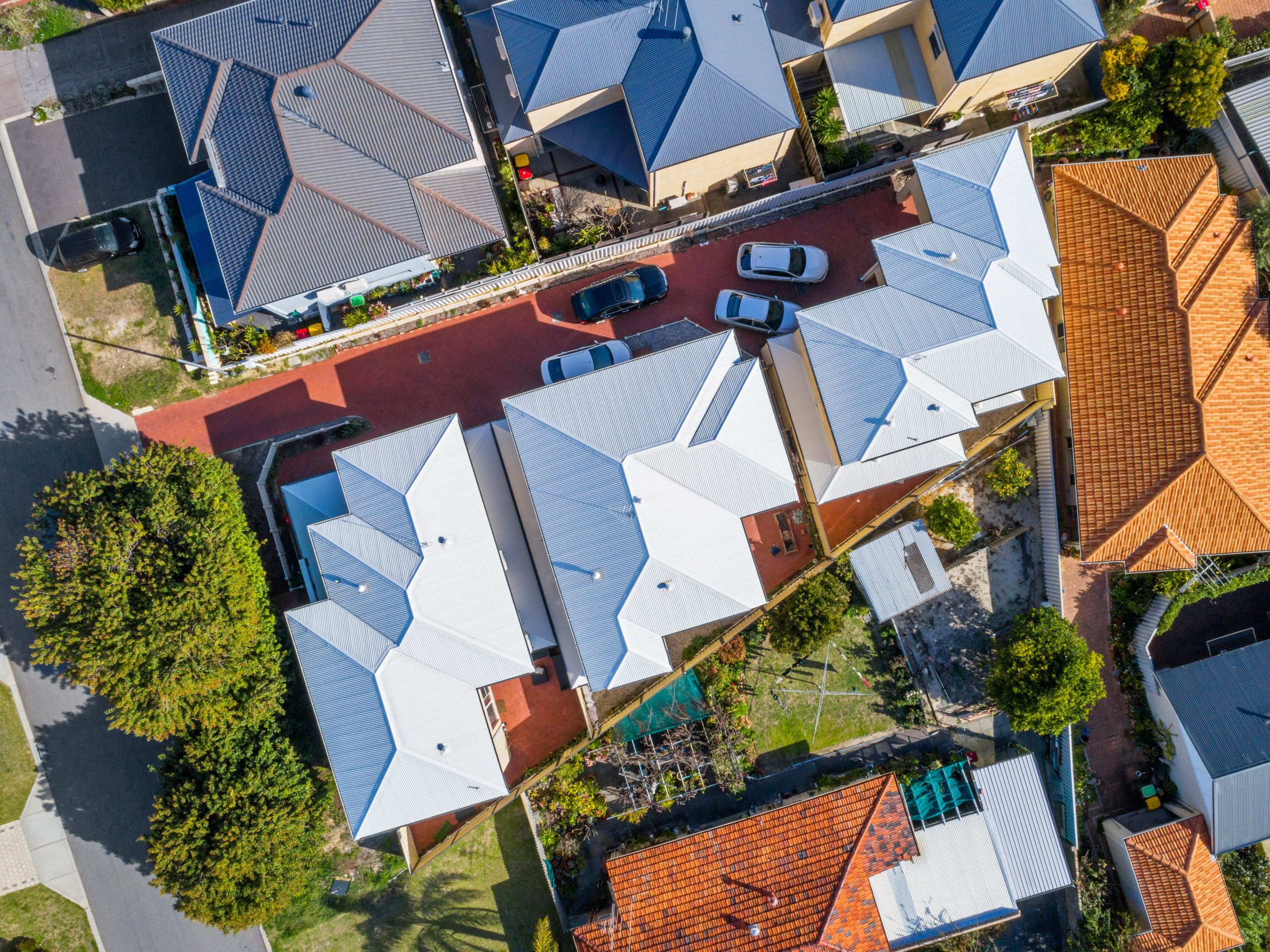 Triplex Plunkett Homes