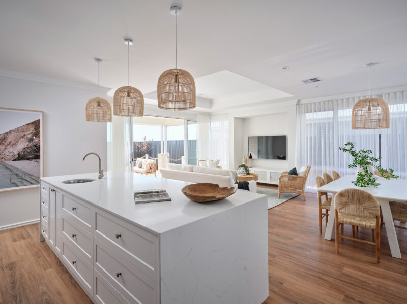 An open plan kitchen and living layout that provides an easy view from the main areas out to the garden, is suited for young families in this Plunkett Home.